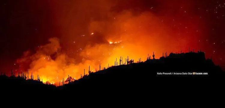 Luchan más de mil bomberos contra incendio